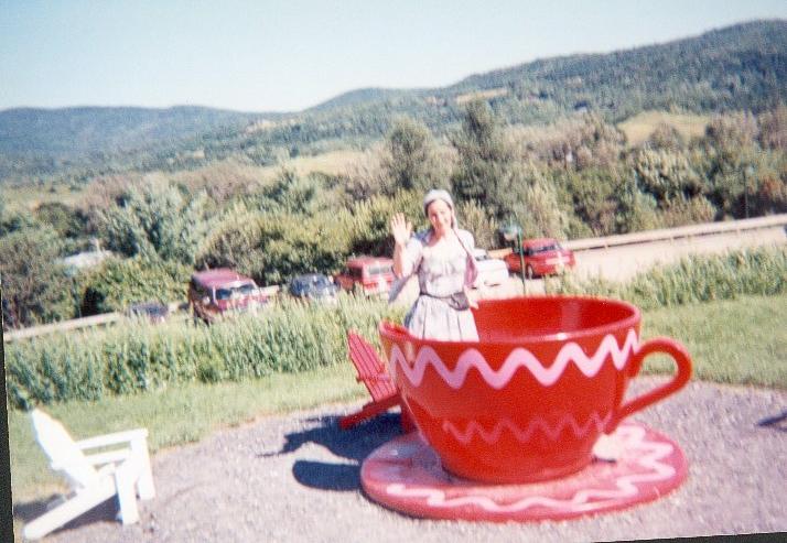 Denise in teacup at Ben and Jerrys in Vermont