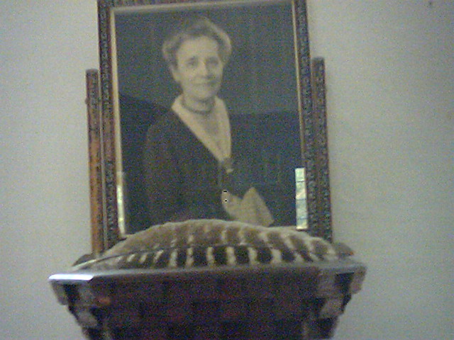 Marion MacDowell, with a hawk feather, portrait in MacDowell Colony Library